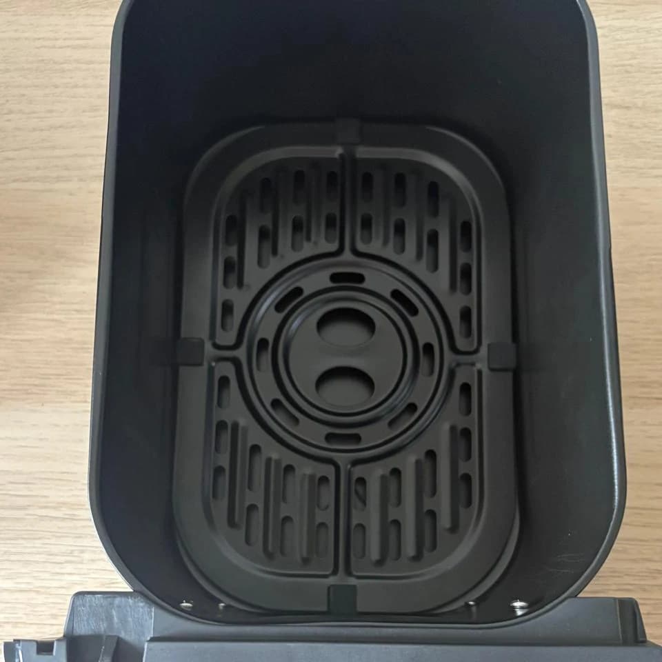 Inside one basket, with the non-stick rack at the bottom