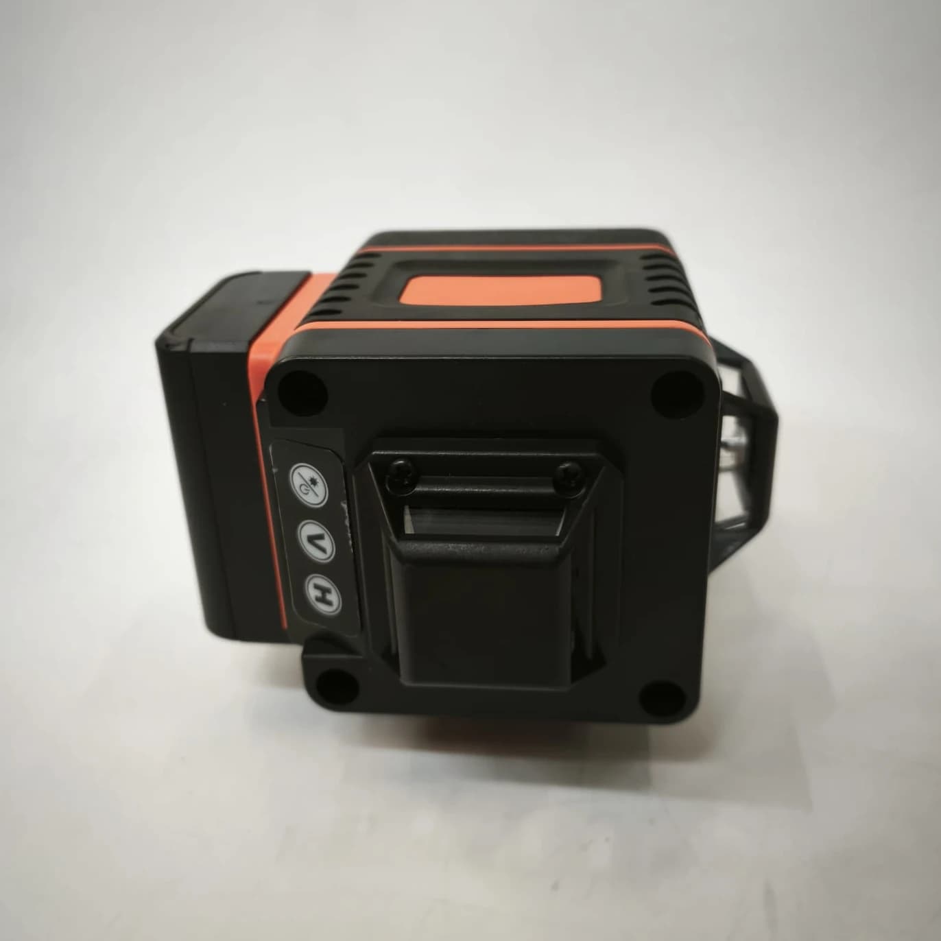 Side of the laser level with its three-button keypad