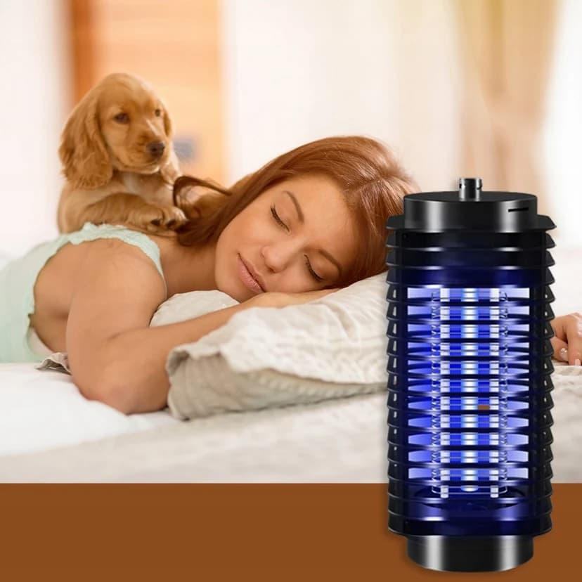 The insect trap lamp glowing beside a bed